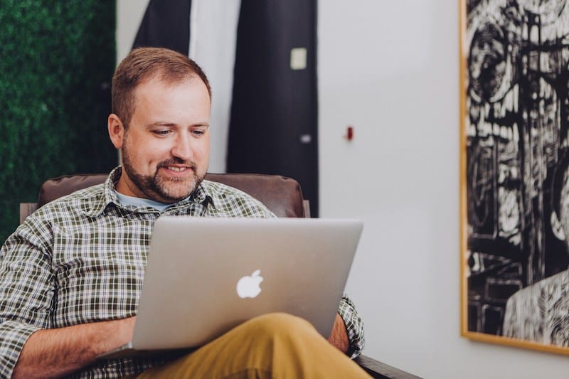 man learning on computer