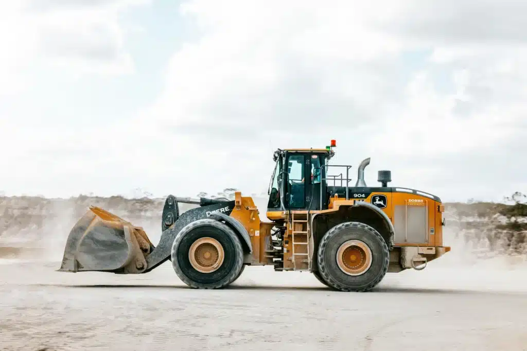 A John Deere wheel loader at a pit mine.